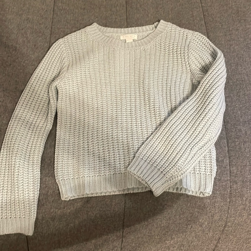 light blue sweater